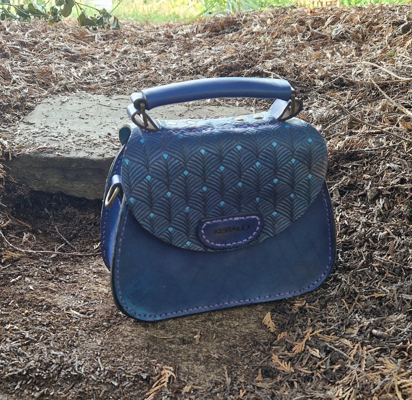 Saddlebag, hand-tooled art deco design