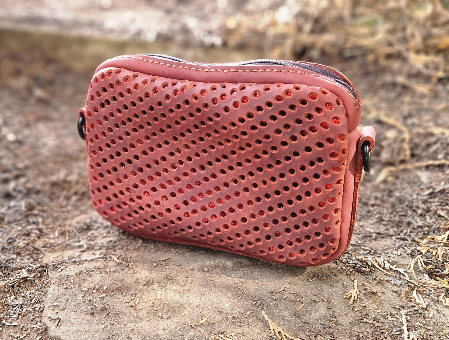 Evening clutch with sparkly leather underlay
