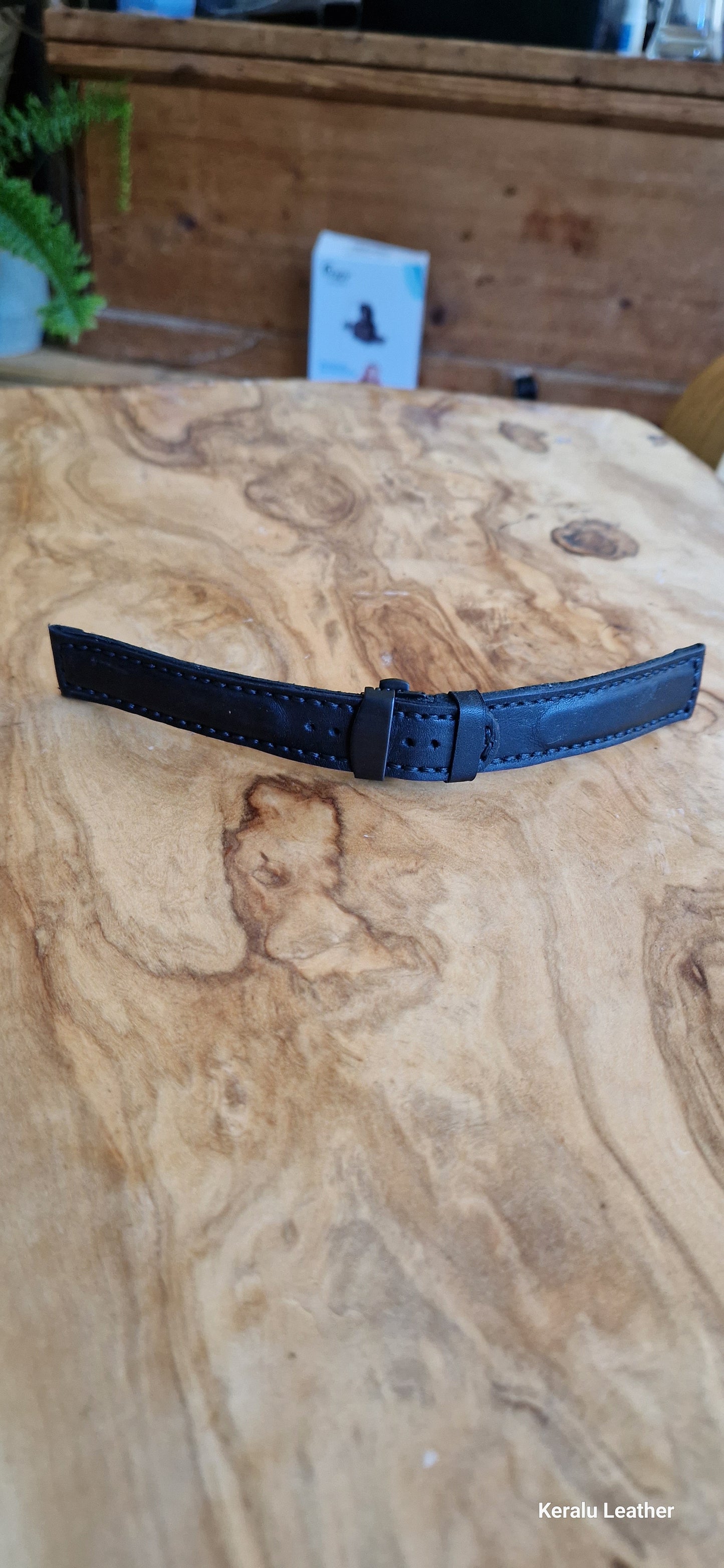 Watch strap with butterfly deployment clasp