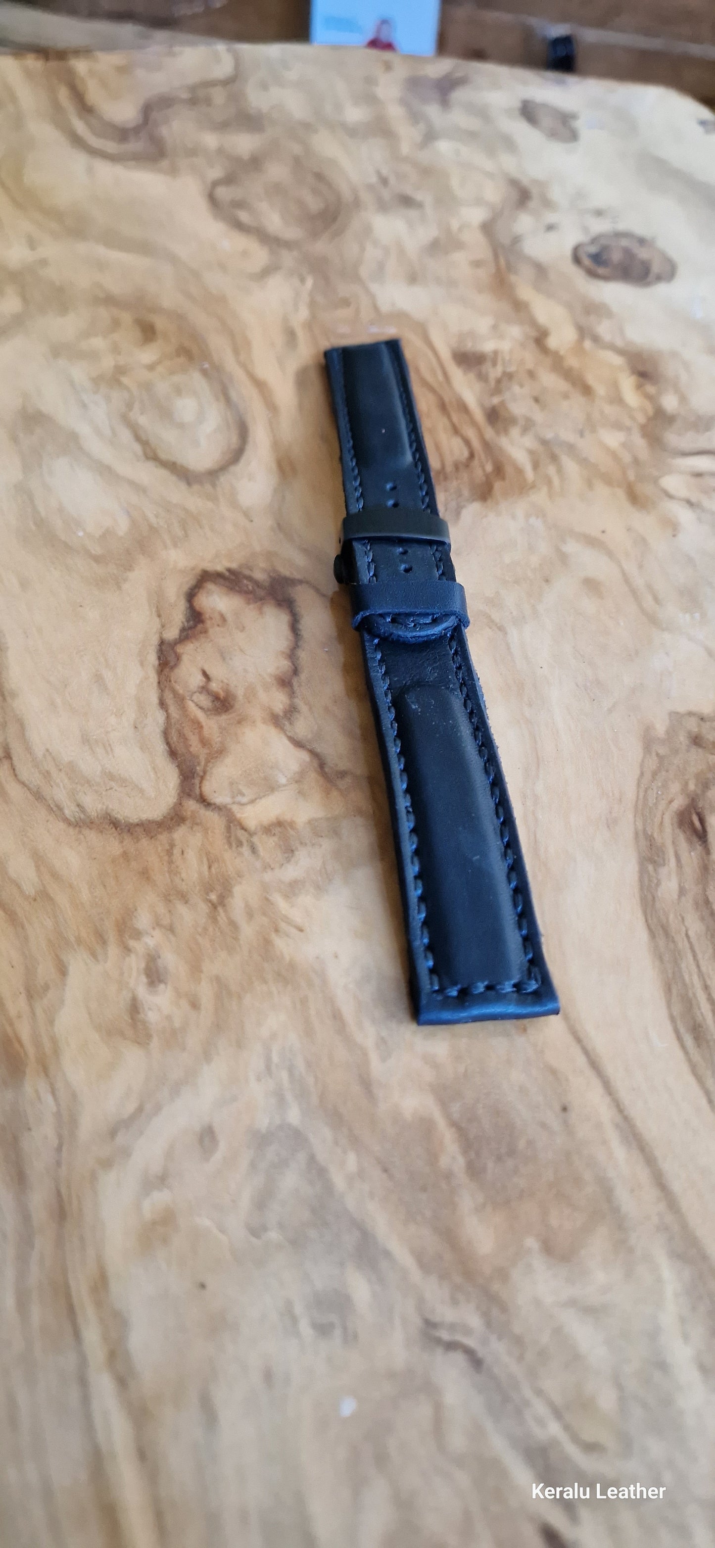 Watch strap with butterfly deployment clasp