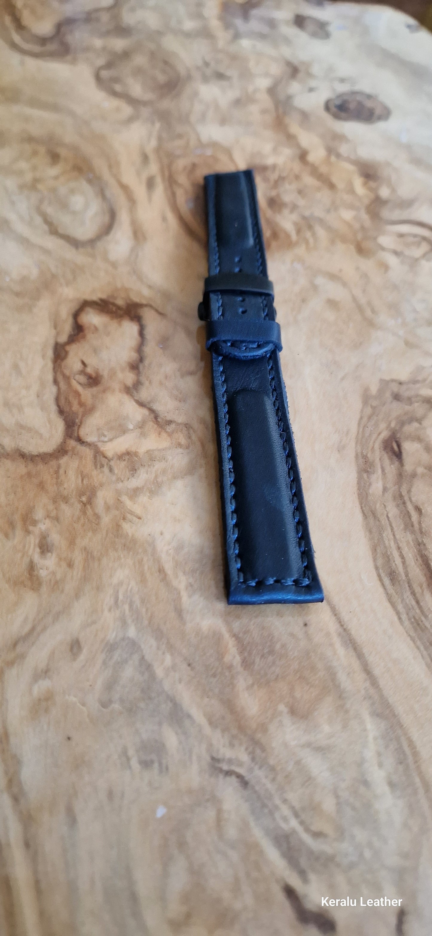 Watch strap with butterfly deployment clasp