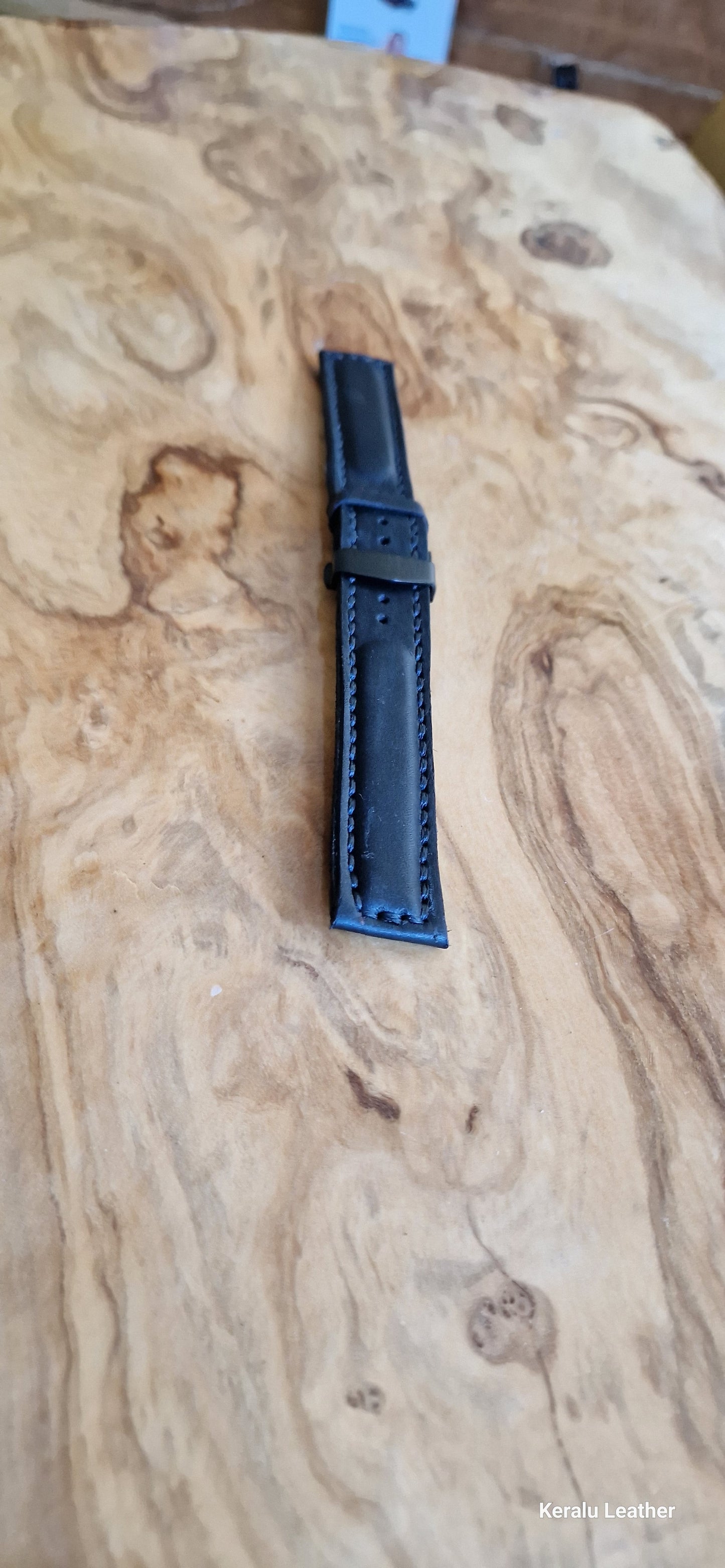 Watch strap with butterfly deployment clasp