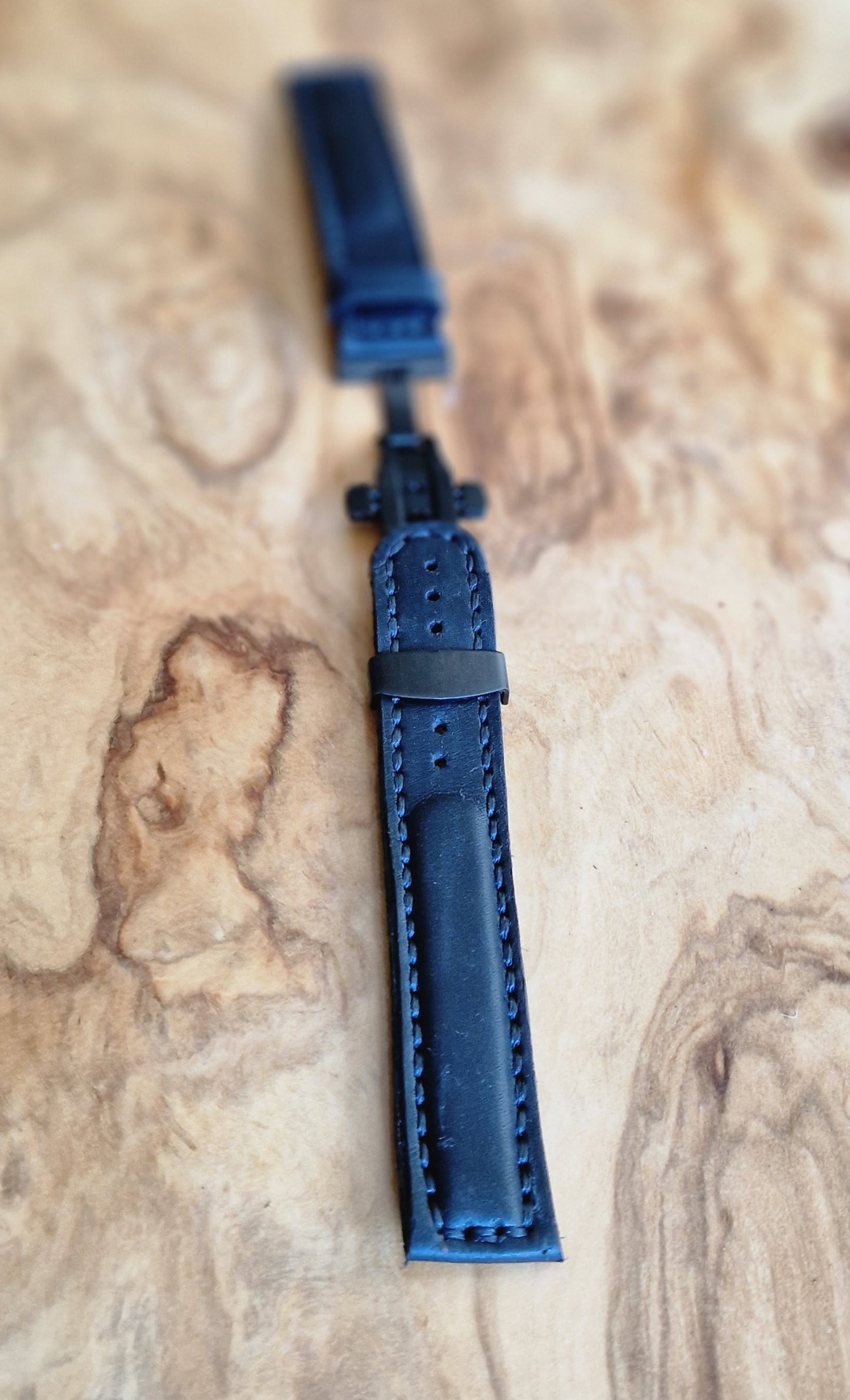 Watch strap with butterfly deployment clasp