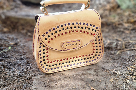 Saddlebag tooled and leather inlay
