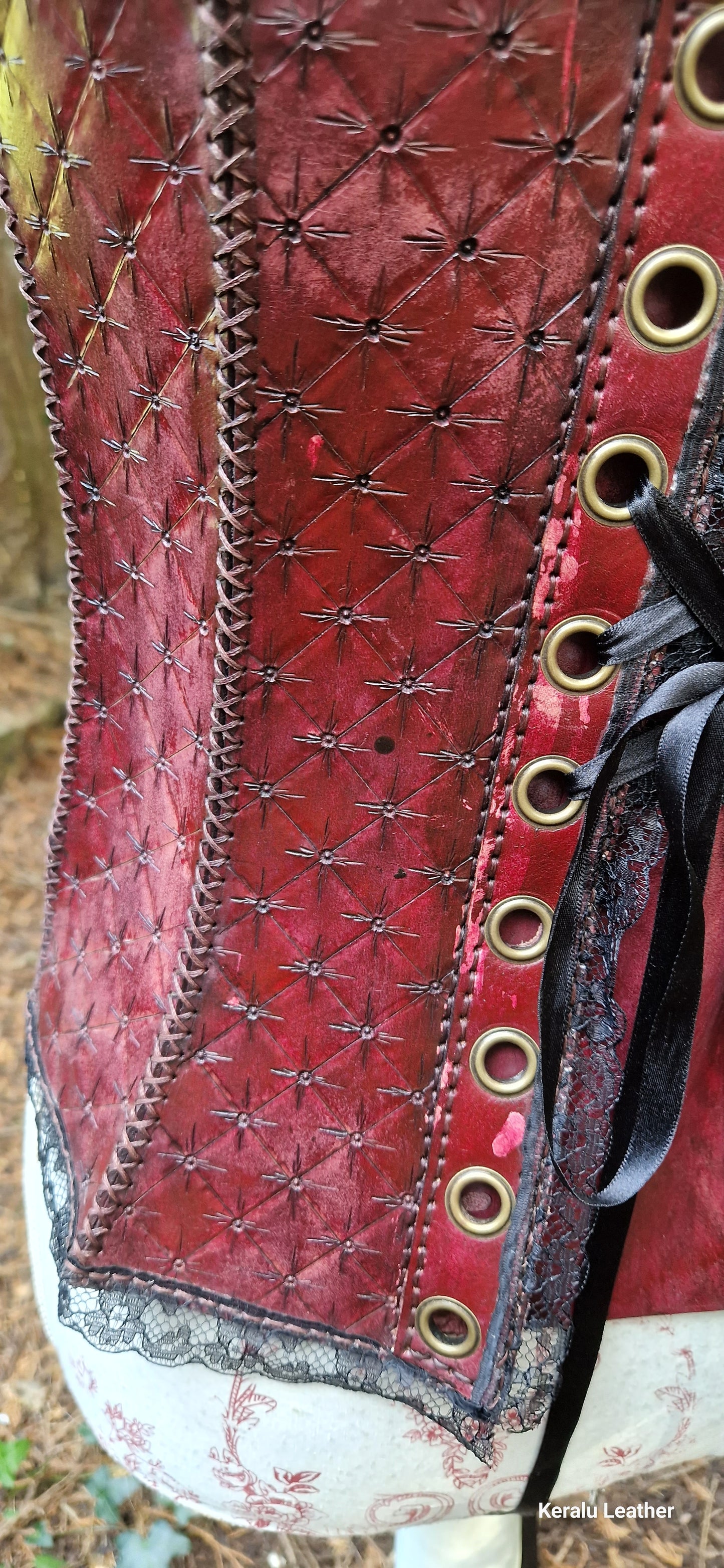 Corset, hand-tooled high quality leather with lace edging. A labour of love